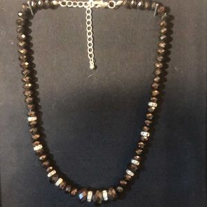 Great accessory to dress up any outfit. Very versatile.